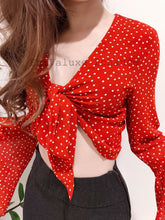 Load image into Gallery viewer, A polka dot red crop top
