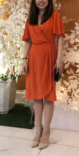 Load image into Gallery viewer, BCBG orange silk wrap dress
